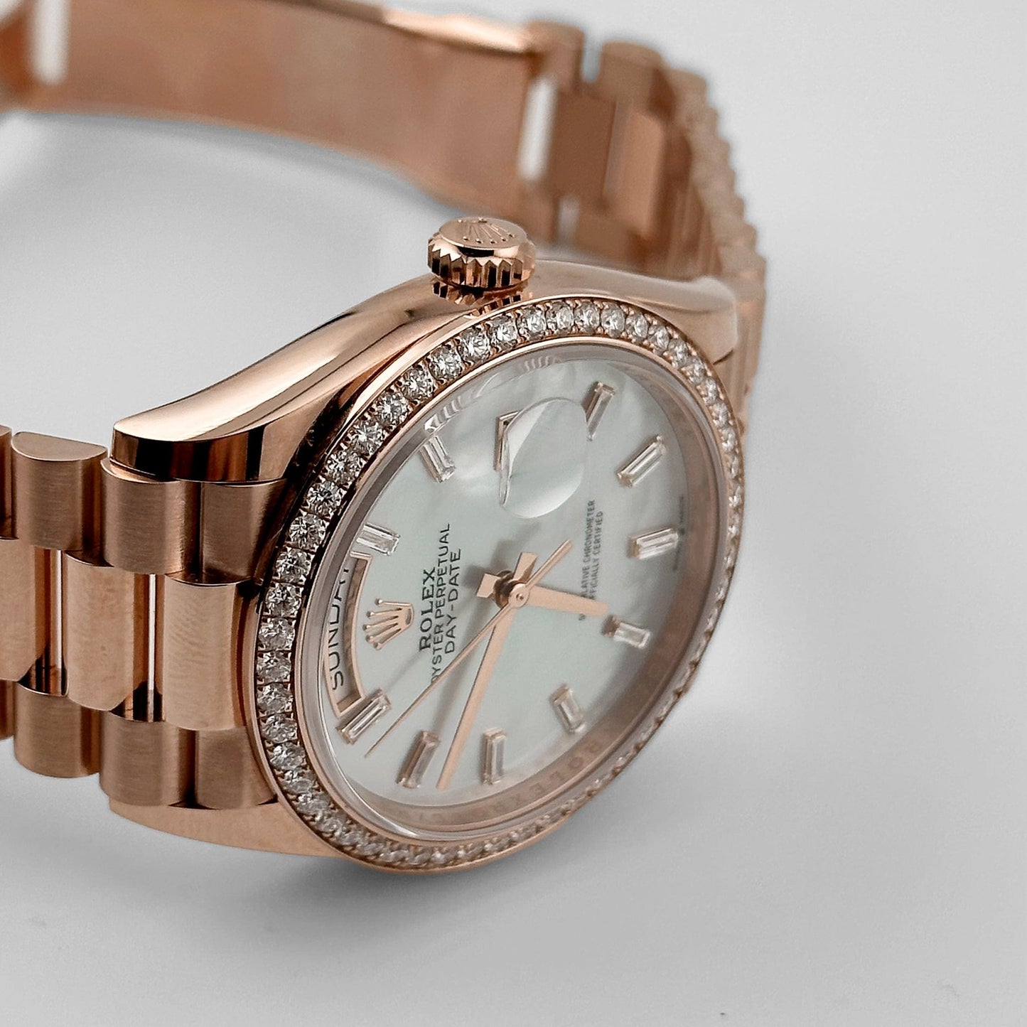 Rolex Day-Date 36 128345RBR Rose Gold Mother of Pearl Diamond Bezel